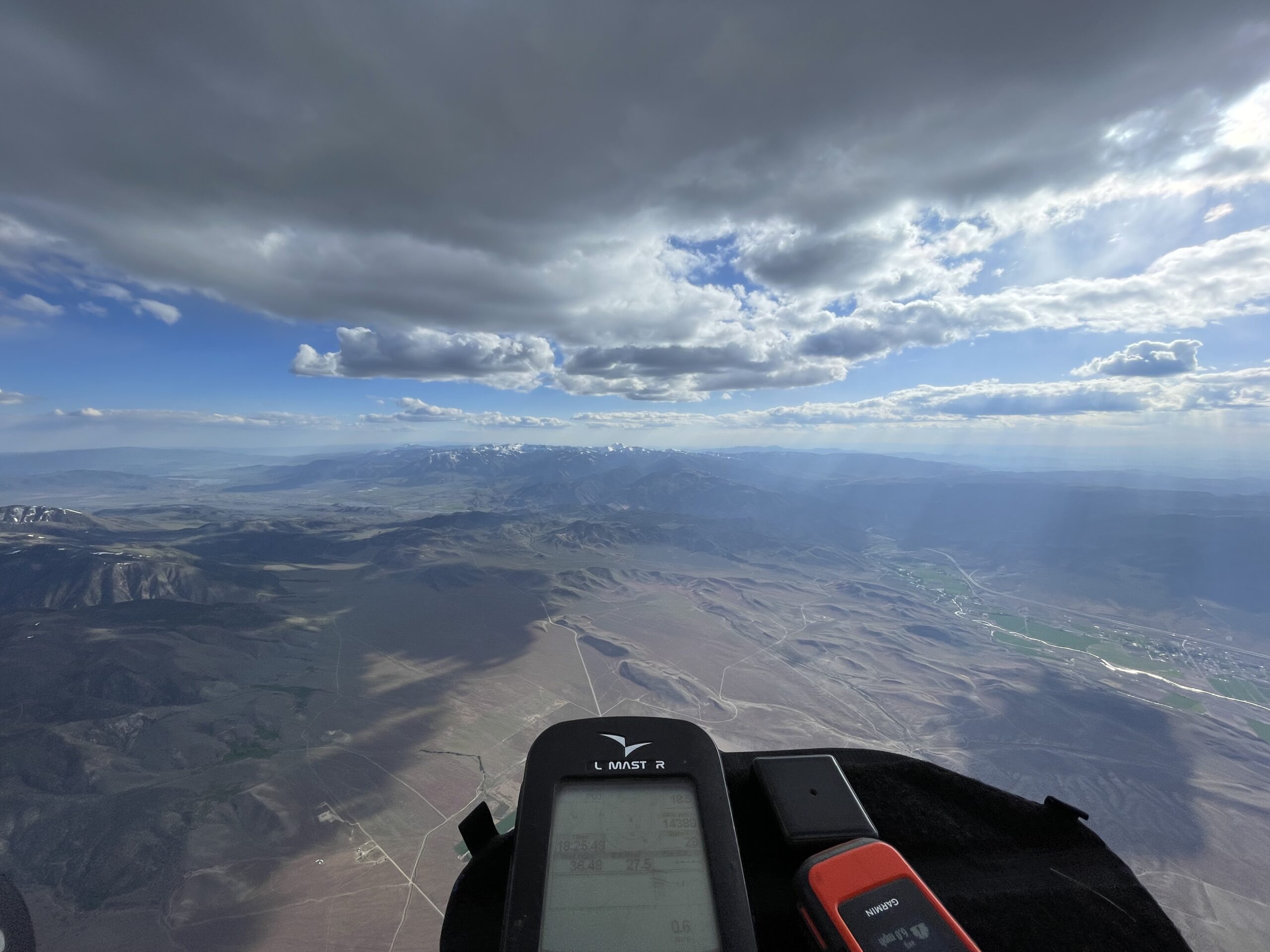 Flight instruments over the clouds during an evening flight